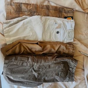 Bundle of 4 pairs of shorts. Two pairs are new and 2 pairs are gently worn.
